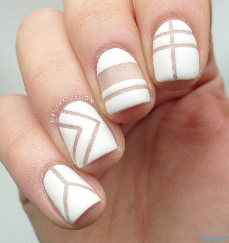 matte nail negative space white mani with lines thefashionspot