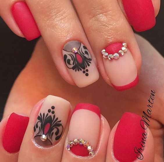pink nails nude and red half moon with black design nail art styling