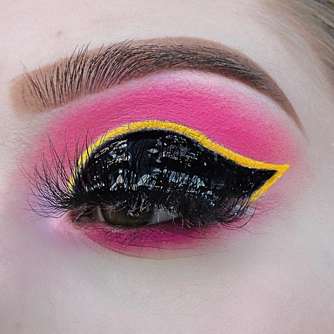 oily black with pink shadow
