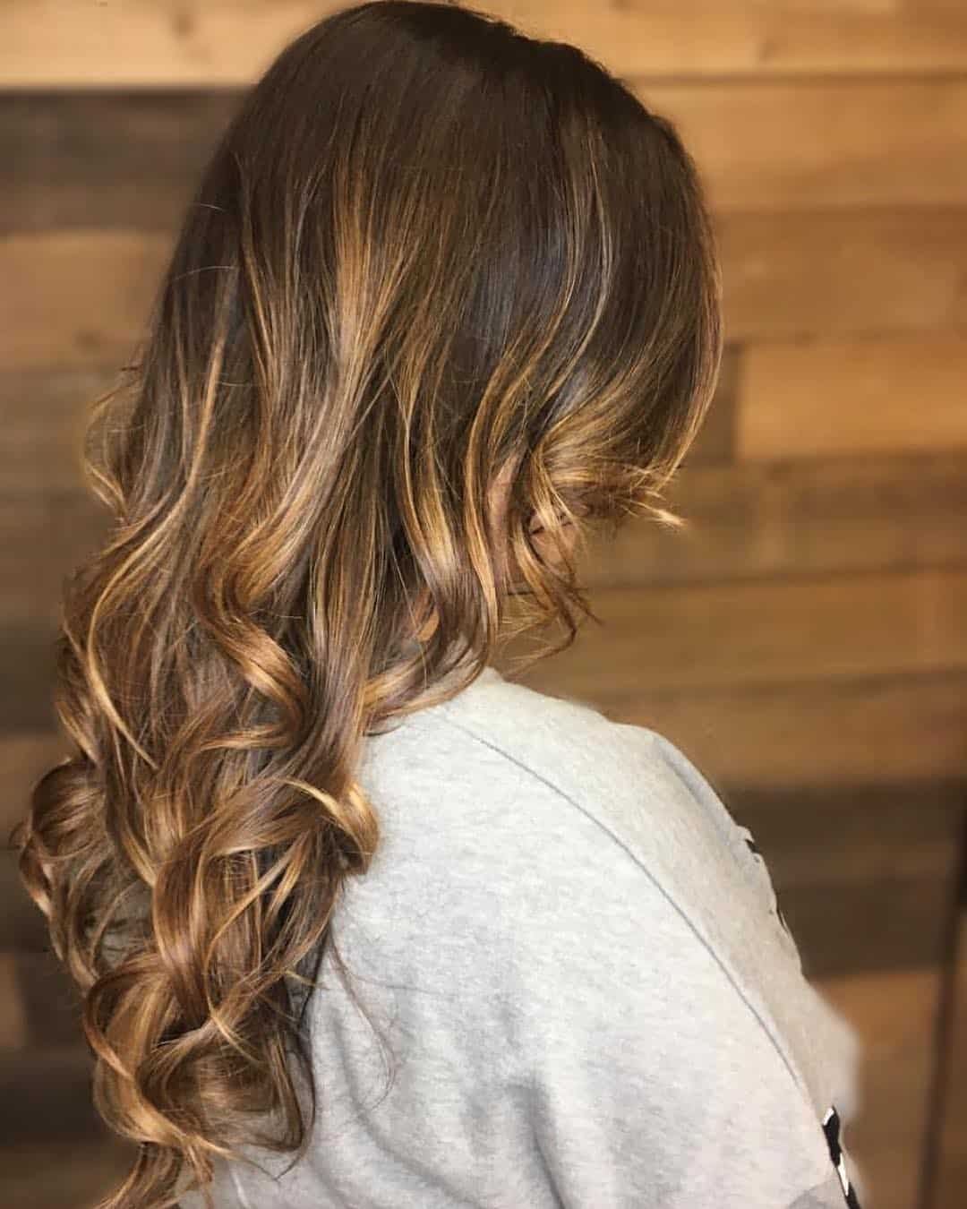 Soft Curled Bright Caramel Ribbons On Lighter Brown