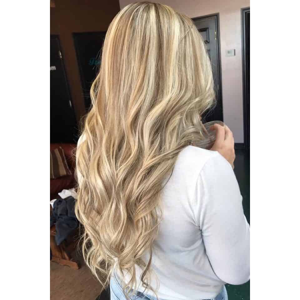 Beach Wave Blonde With Splash Of Caramel Highlights