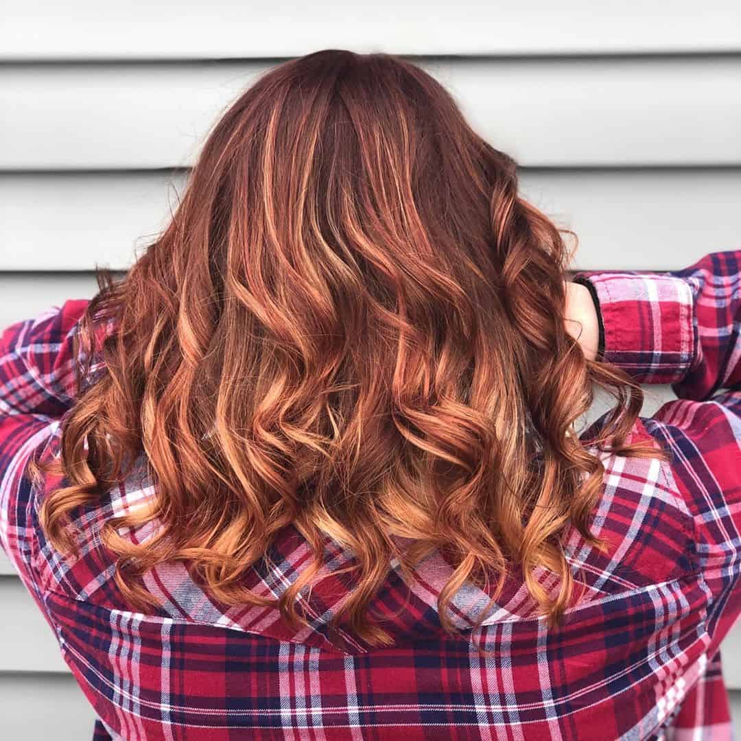 Copper Red Curls With Caramel Highlights