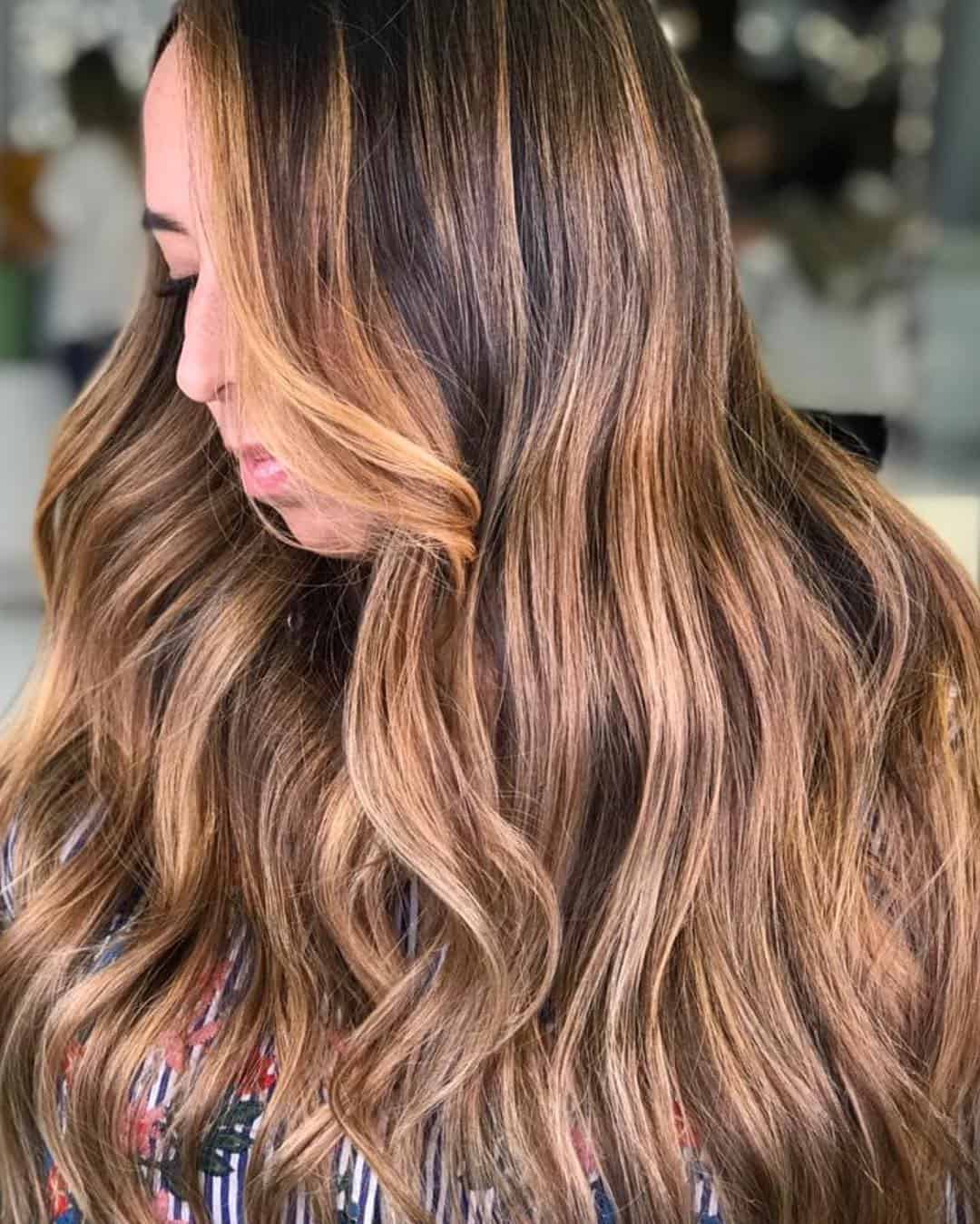 Waves Of Dark Caramel Balayage With Warmer Highlights