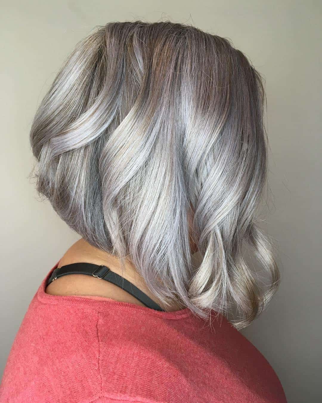 Ash Blond To Silver Balayage On Curled Inverted Bob