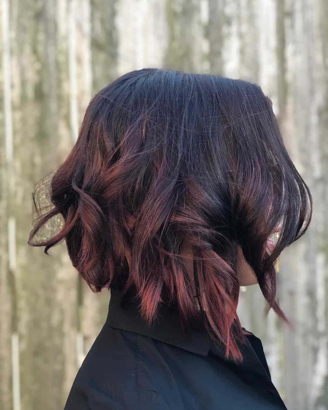 Brunette Inverted Bob With Soft Curls And Peachy Rose Tips