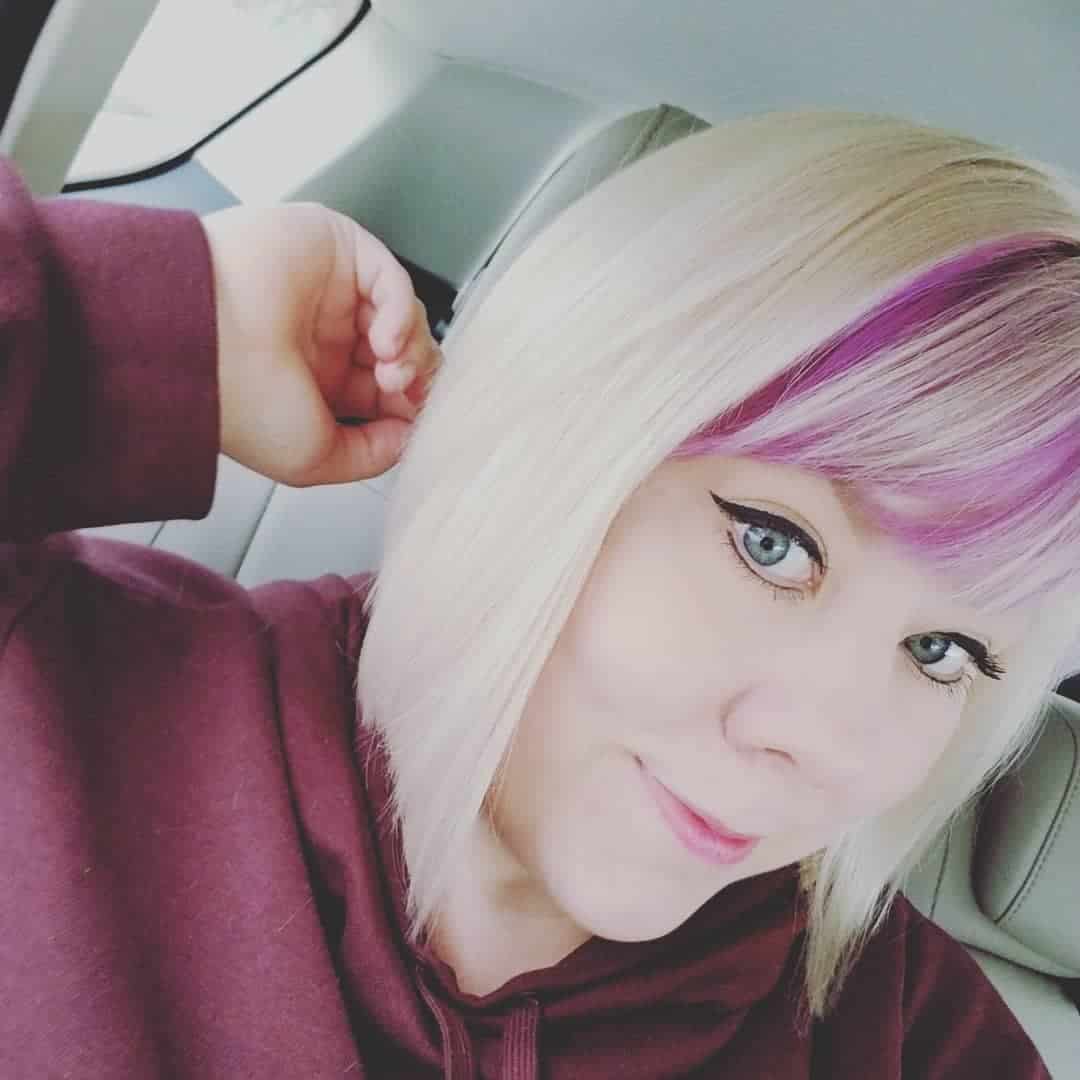 Blonde Inverted Bob With Pink Streaked Bangs