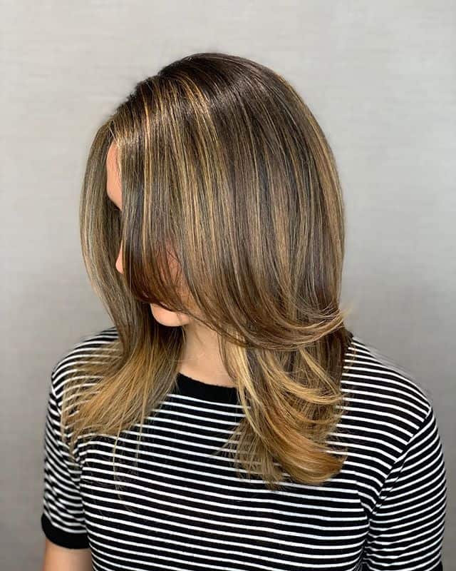 Sectioned Cut With Gentle Blowout And Blonde Balayage