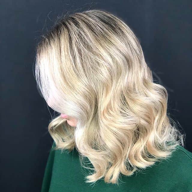 Waved Ash Blonde With Golden Hues