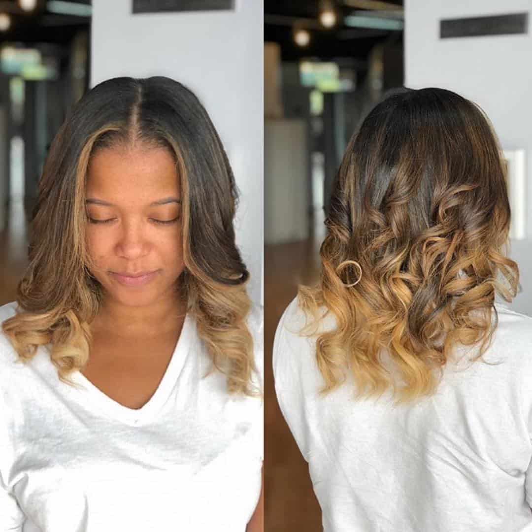 Middle Parted Soft Curls On Caramel Balayage