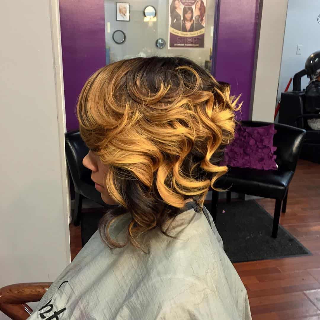 Curly Asymmetrical Bob In Golden Blonde