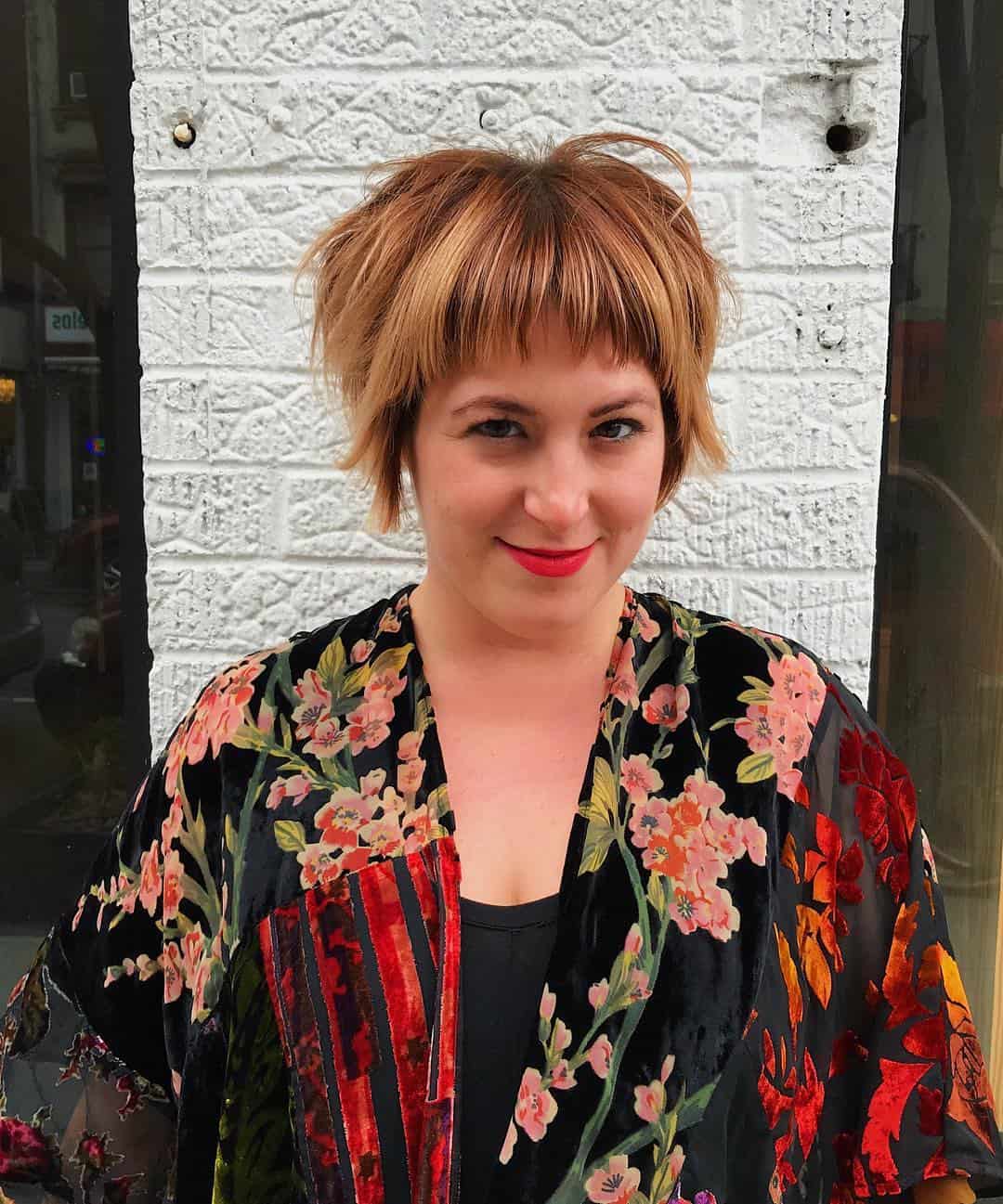 Choppy Highlighted Bangs On Voluminous Pixie