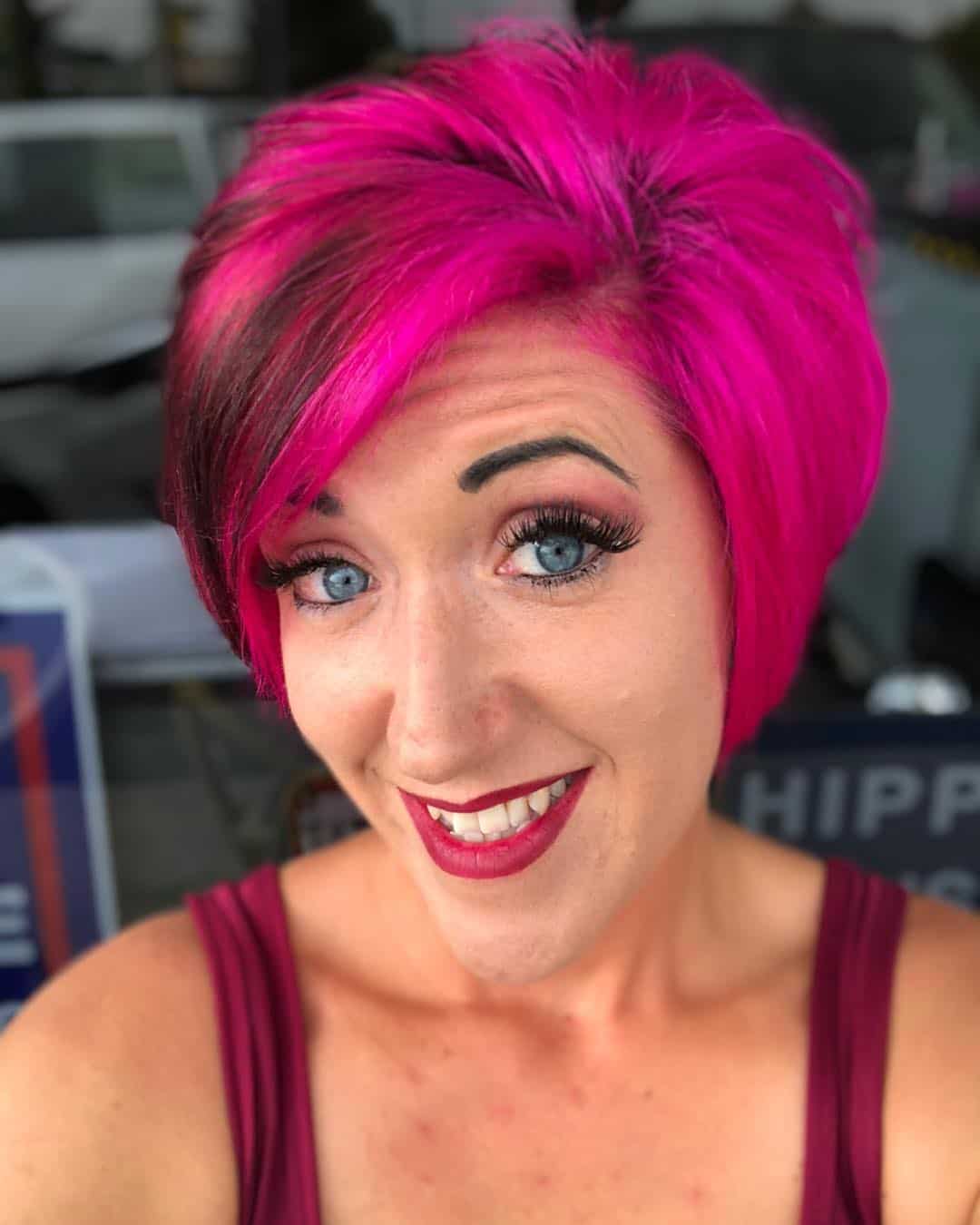 Neon Pink Pixie With Subtle Black Balayage