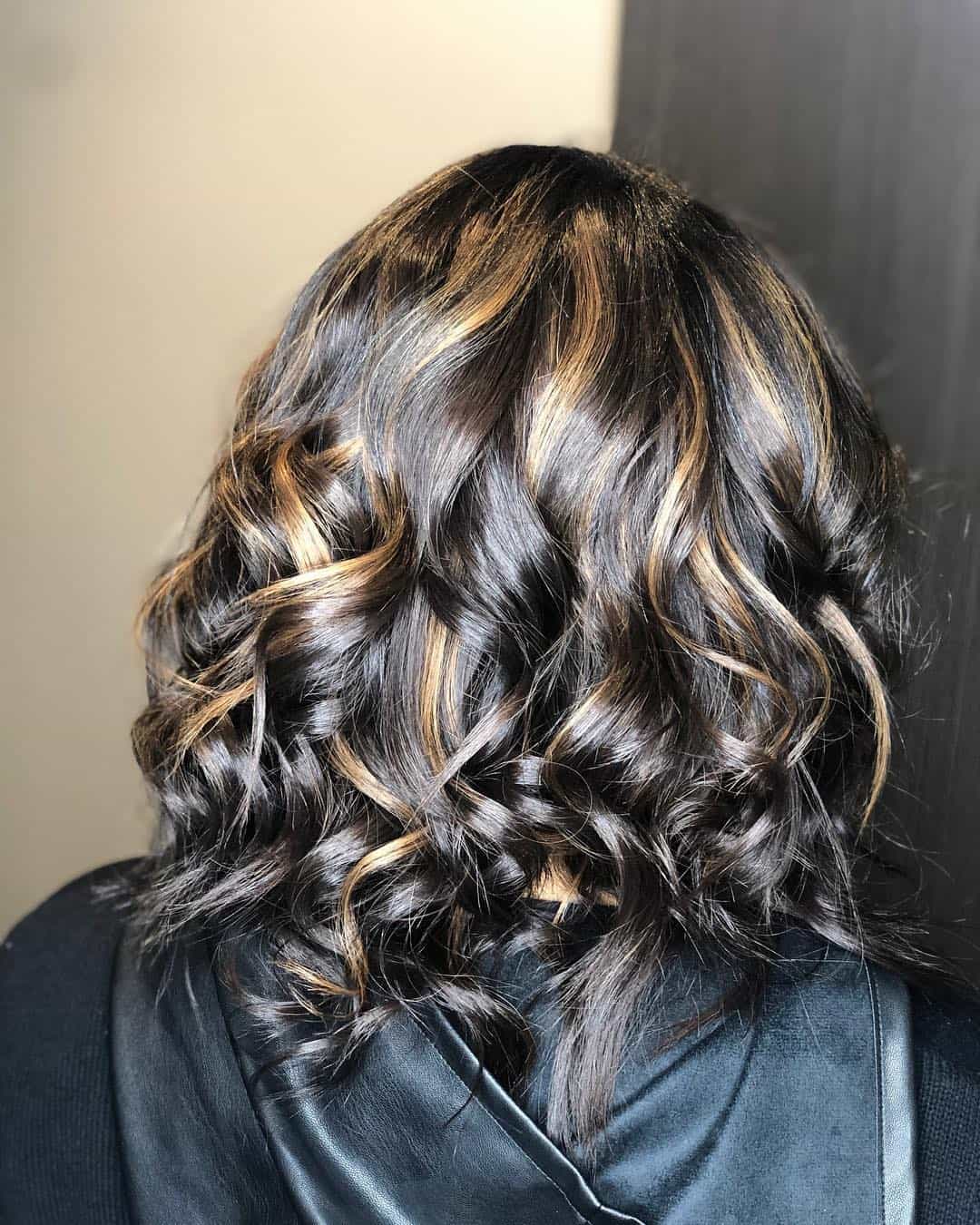 Curled Black Bob With Honey Blonde Balayage