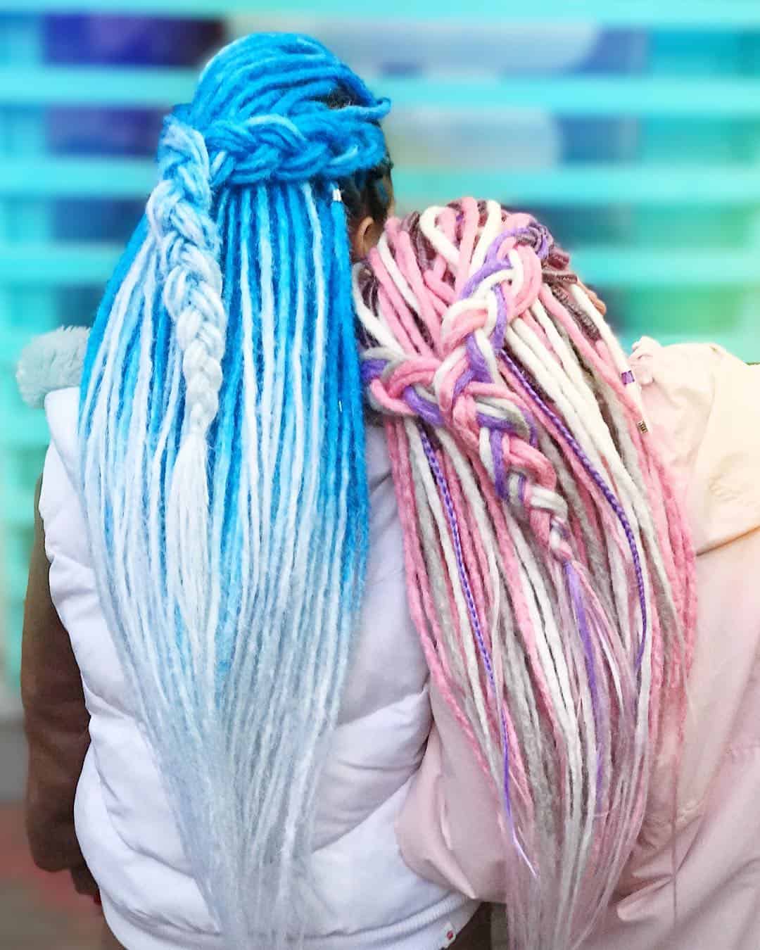 Tied Back French Braid On Blue And Pink Hued Dreadlocks