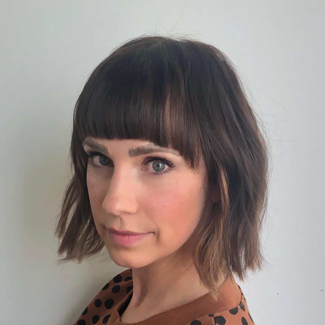 Dark Brown Bob With Peekaboo Blonde Highlights