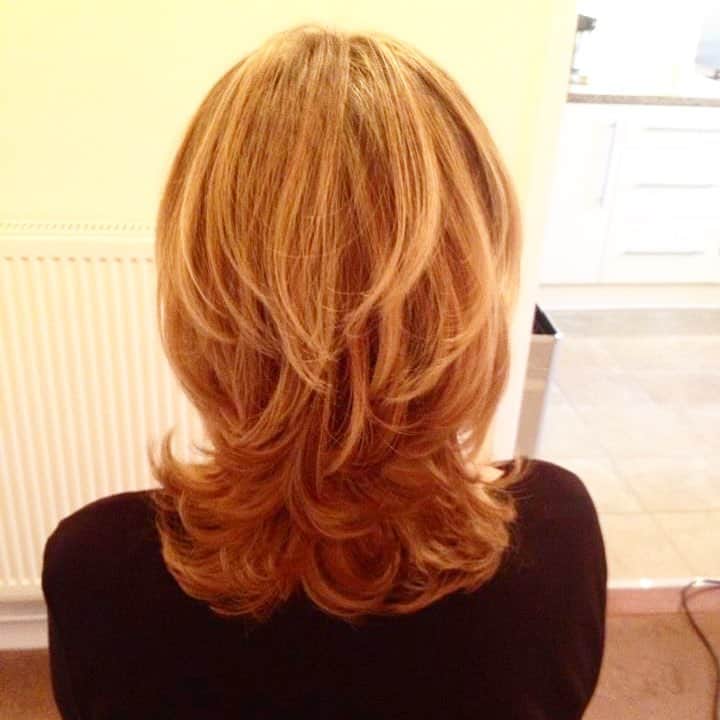 Honey Blonde Sectioned Shoulder Length With Styled Flicks