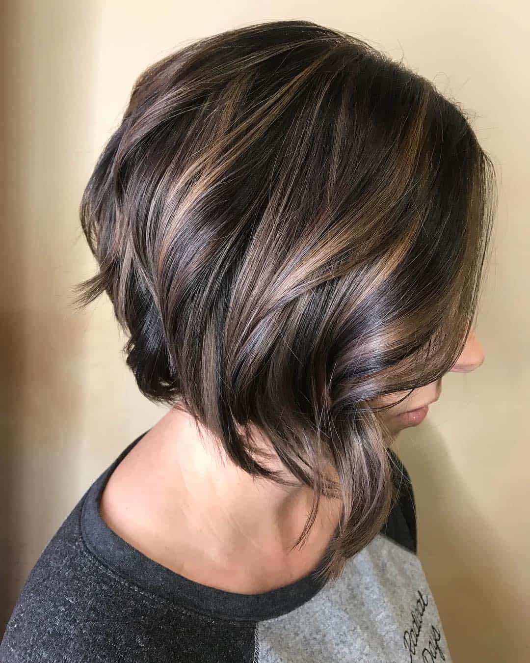 Long Asymmetrical Pixie With Soft Highlights