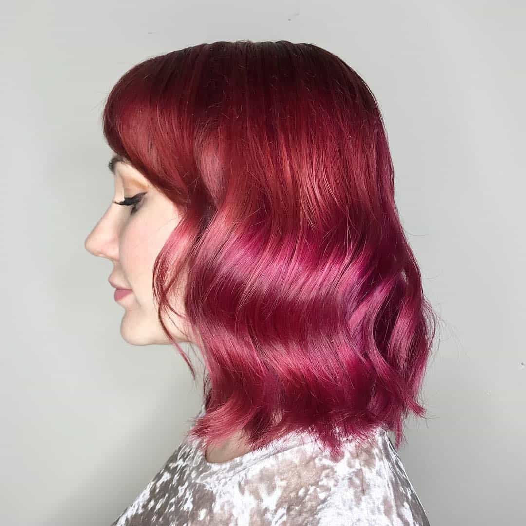 Wavy Red Lob With Side Swept Bangs