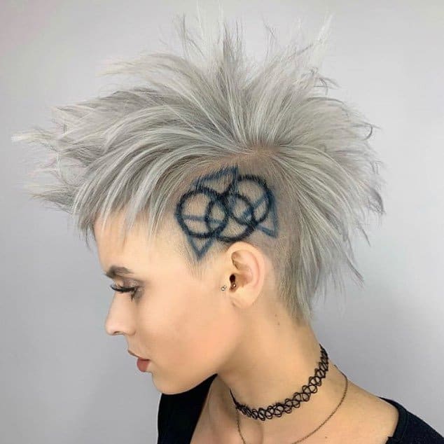 Black And Blue Circles And Geometrical Undercut Deign On Platinum Mohawk