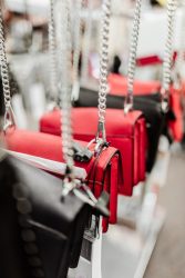 red and silver padlock on gray metal chain