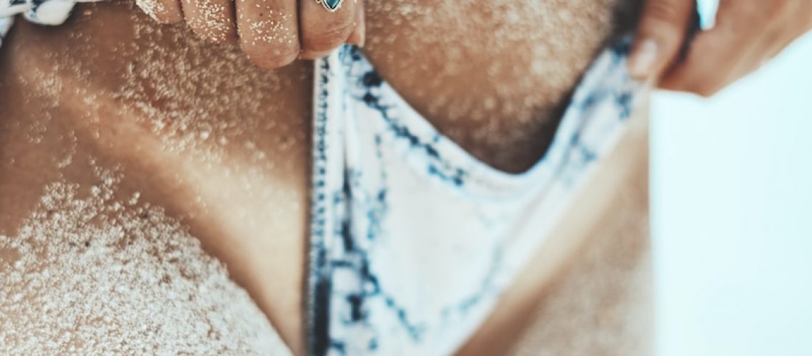 a close up of a person wearing a bikini